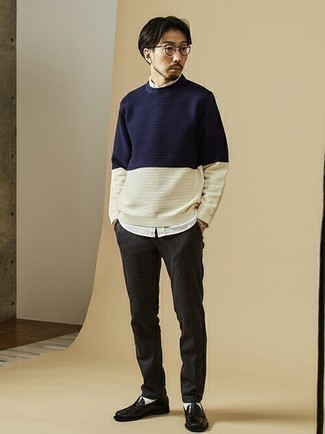 White and Navy Crew-neck Sweater Outfits For Men: For a relaxed casual ensemble, wear a white and navy crew-neck sweater with charcoal chinos — these two pieces fit really good together. Give an added touch of refinement to your outfit by rocking a pair of black leather loafers.