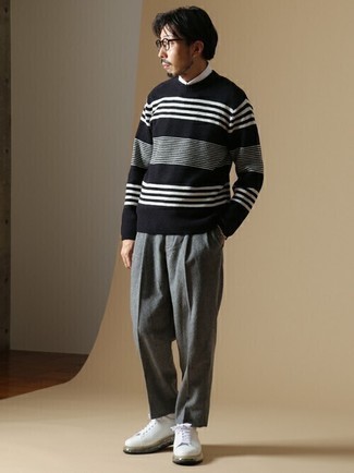Black and White Horizontal Striped Crew-neck Sweater Outfits For Men: This casual combo of a black and white horizontal striped crew-neck sweater and grey chinos is perfect if you want to feel confident in your getup. When it comes to footwear, this ensemble is complemented well with white leather low top sneakers.