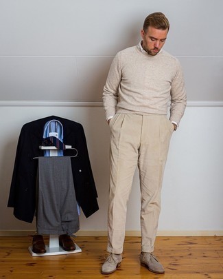 Beige Crew-neck Sweater Outfits For Men: The formula for neat casual style for men? A beige crew-neck sweater with beige corduroy chinos. Complement this outfit with a pair of tan suede desert boots and the whole getup will come together wonderfully.