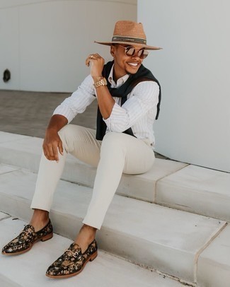 Tan Straw Hat Outfits For Men: This combo of a black crew-neck sweater and a tan straw hat is hard proof that a safe casual ensemble can still look really interesting. Put an elegant spin on this ensemble by slipping into a pair of black floral canvas loafers.