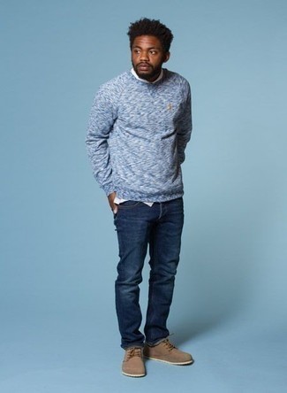 Brown Suede Low Top Sneakers Outfits For Men: For an on-trend ensemble without the need to sacrifice on functionality, we turn to this pairing of a light blue crew-neck sweater and navy jeans. Brown suede low top sneakers are a foolproof footwear option here that's full of personality.