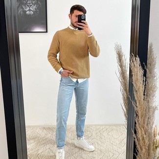 Men's Tan Crew-neck Sweater, White Long Sleeve Shirt, Light Blue Jeans, White Leather Low Top Sneakers