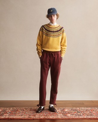 Brown Sweatpants Outfits For Men: Such must-haves as a yellow fair isle crew-neck sweater and brown sweatpants are the perfect way to inject played down dapperness into your current routine. Here's how to smarten up this ensemble: dark brown leather tassel loafers.