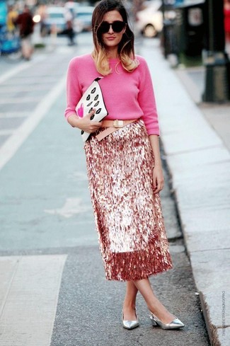 Hot Pink Crew-neck Sweater Outfits For Women: This combination of a hot pink crew-neck sweater and a pink sequin midi skirt is super easy to assemble and so comfortable to rock a version of over the course of the day as well! And if you wish to easily step up your ensemble with one item, why not complete this ensemble with a pair of silver leather pumps?