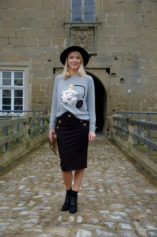 Charcoal Print Crew-neck Sweater Outfits For Women: Master casual style by wearing a charcoal print crew-neck sweater and a black embellished pencil skirt. Our favorite of a multitude of ways to round off this look is with a pair of black suede ankle boots.
