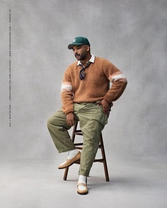 Tan Fluffy Crew-neck Sweater Outfits For Men: Rock a tan fluffy crew-neck sweater with olive cargo pants to display your styling savvy. Tan leather loafers will bring an extra touch of style to an otherwise standard look.