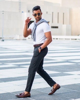 White Polo Outfits For Men: This combo of a white polo and charcoal chinos is super easy to assemble and so comfortable to sport over the course of the day as well! To add elegance to your outfit, finish with dark brown leather tassel loafers.