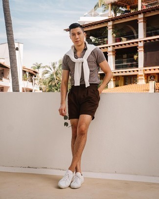 Dark Brown Shorts Outfits For Men: Look stylish yet comfortable by wearing a white crew-neck sweater and dark brown shorts. If you're hesitant about how to round off, introduce a pair of white leather low top sneakers to your look.