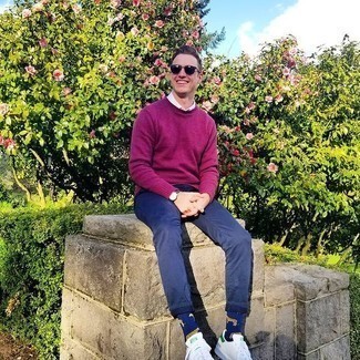 Purple Crew-neck Sweater Outfits For Men: Team a purple crew-neck sweater with navy chinos to don a casually cool outfit. Complete your outfit with white and green leather low top sneakers to keep the ensemble fresh.