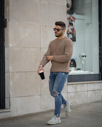 Brown Crew-neck Sweater Outfits For Men: For an outfit that's super easy but can be manipulated in plenty of different ways, try pairing a brown crew-neck sweater with blue ripped skinny jeans. Beige athletic shoes are a surefire footwear option here that's also full of character.