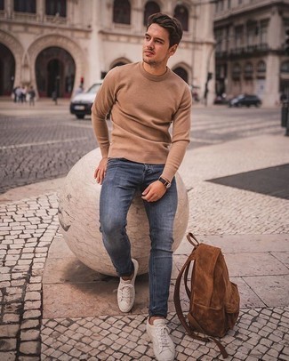 Brown Suede Backpack Outfits For Men: For an off-duty outfit, pair a tan crew-neck sweater with a brown suede backpack — these items go really well together. For something more on the elegant side to finish this ensemble, opt for a pair of white canvas low top sneakers.