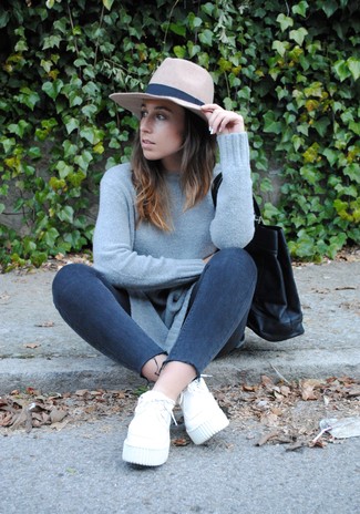 Women's Grey Crew-neck Sweater, Charcoal Skinny Jeans, White Low Top Sneakers, Black Leather Tote Bag