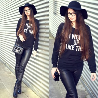 Black Crew-neck Sweater Outfits For Women: Such pieces as a black crew-neck sweater and black leather skinny pants are an easy way to infuse extra cool into your casual rotation. Black leather ankle boots will easily spruce up even the most casual of getups.