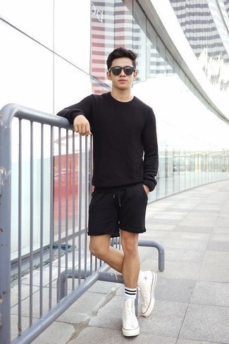 Black Sports Shorts Outfits For Men: Something as simple as wearing a black crew-neck sweater and black sports shorts can potentially set you apart from the crowd. If you're puzzled as to how to finish off, complete this getup with white canvas high top sneakers.