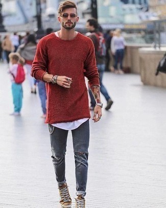 Grey Jeans Outfits For Men: For relaxed dressing with a modern spin, you can easily rock a red crew-neck sweater and grey jeans. Complete your getup with a pair of tan suede high top sneakers to effortlessly amp up the street cred of your look.