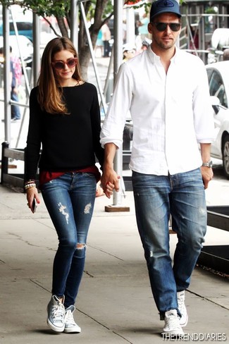 Olivia Palermo wearing Black Crew-neck Sweater, Burgundy Tank, Blue Ripped Skinny Jeans, Grey High Top Sneakers