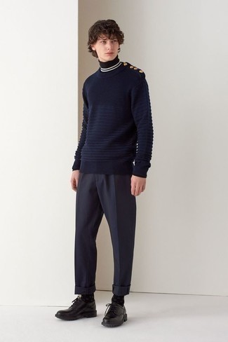 Black Chunky Leather Derby Shoes Outfits: This combo of a navy crew-neck sweater and navy chinos is the perfect foundation for a casually dapper ensemble. If you need to effortlessly perk up your look with a pair of shoes, complement this ensemble with a pair of black chunky leather derby shoes.