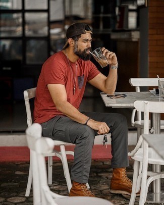 Grey Cargo Pants Outfits: For a casually cool getup, dress in a red crew-neck t-shirt and grey cargo pants — these pieces go pretty good together. If you wish to instantly up the style ante of this ensemble with one single item, introduce a pair of brown leather casual boots to this outfit.