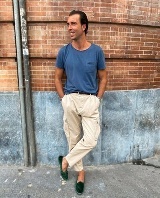 Beige Cargo Pants Outfits: A blue crew-neck t-shirt and beige cargo pants are must-have must-haves if you're planning a casual wardrobe that holds to the highest style standards. Dark green velvet loafers will breathe a touch of elegance into an otherwise mostly casual ensemble.