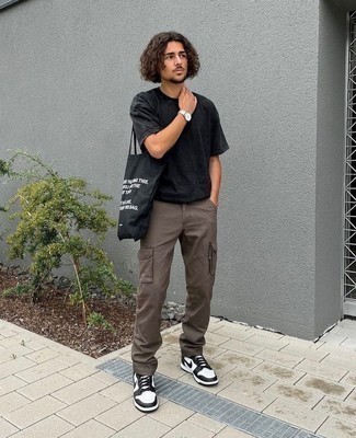 Men's Black Crew-neck T-shirt, Dark Brown Cargo Pants, White and Black Leather Low Top Sneakers, Black and White Print Canvas Tote Bag
