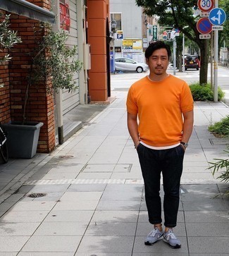 Navy Chinos Outfits: An orange knit crew-neck t-shirt and navy chinos? This is an easy-to-wear look that you can rock on a daily basis. Want to dial it down on the shoe front? Add grey athletic shoes to the mix for the day.