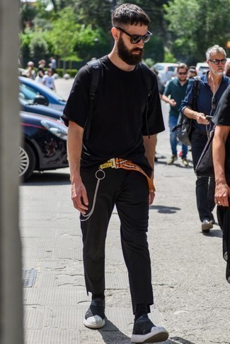 Yellow Canvas Belt Outfits For Men: If you gravitate towards comfort dressing, why not take this combo of a black crew-neck t-shirt and a yellow canvas belt for a spin? Unimpressed with this getup? Introduce a pair of black and white athletic shoes to jazz things up.