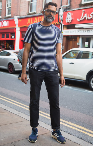 Navy Horizontal Striped Crew-neck T-shirt Outfits For Men: This laid-back combo of a navy horizontal striped crew-neck t-shirt and black chinos is a winning option when you need to look cool and relaxed but have zero time to spare. Let your styling savvy really shine by completing this look with a pair of navy and white athletic shoes.