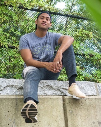 Charcoal Check Chinos Outfits: This off-duty combo of a grey print crew-neck t-shirt and charcoal check chinos is simple, seriously stylish and extremely easy to imitate. Finishing with beige athletic shoes is an easy way to introduce a playful feel to this getup.