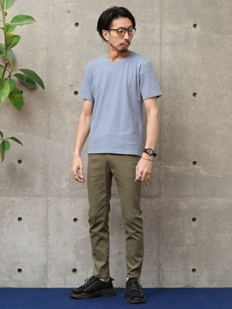 Light Blue Crew-neck T-shirt Outfits For Men: A light blue crew-neck t-shirt and olive chinos are absolute menswear must-haves that will integrate really well within your casual styling arsenal. Bring a playful vibe to by slipping into a pair of black athletic shoes.