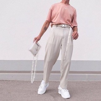 White Leather Messenger Bag Outfits: A pink crew-neck t-shirt and a white leather messenger bag are a nice getup to add to your off-duty fashion mix. To give your overall getup a smarter touch, why not complement this outfit with white athletic shoes?