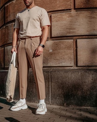 Beige Athletic Shoes Outfits For Men: Combining a beige crew-neck t-shirt with khaki chinos is an on-point idea for an off-duty look. Go ahead and introduce a pair of beige athletic shoes to the mix for a more laid-back twist.