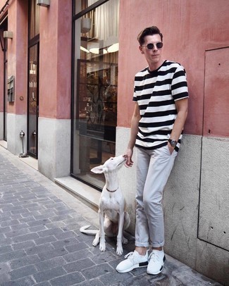 White and Navy Horizontal Striped Crew-neck T-shirt Outfits For Men: For an off-duty outfit, marry a white and navy horizontal striped crew-neck t-shirt with grey chinos — these items work pretty good together. Avoid looking overdressed by finishing with a pair of white and black athletic shoes.