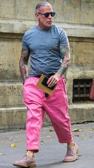 Nick Wooster wearing Blue Crew-neck T-shirt, Hot Pink Chinos, Pink Suede Brogues, Black Leather Belt