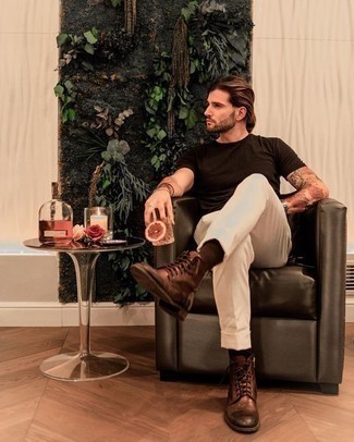 Brown Crew-neck T-shirt Outfits For Men: When the situation allows a laid-back ensemble, reach for a brown crew-neck t-shirt and beige chinos. Rounding off with a pair of brown leather casual boots is a guaranteed way to introduce a little flair to this ensemble.