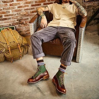Multi colored Print Socks Outfits For Men: Consider pairing a beige crew-neck t-shirt with multi colored print socks for a casual getup with an urban spin. A pair of multi colored leather casual boots easily ups the fashion factor of your look.