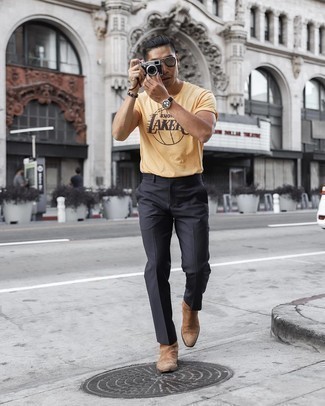 Charcoal Vertical Striped Chinos Outfits: A yellow print crew-neck t-shirt and charcoal vertical striped chinos are a good look to integrate into your current styling arsenal. Balance out this outfit with a more polished kind of shoes, like this pair of tan suede chelsea boots.