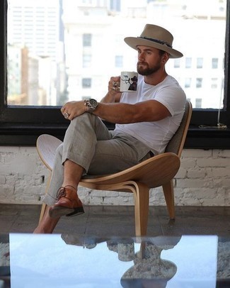 Tan Wool Hat Outfits For Men: This combo of a white crew-neck t-shirt and a tan wool hat resonates comfort off-duty style. Let your styling credentials really shine by finishing off this ensemble with tobacco leather derby shoes.