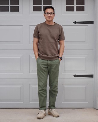 Beige Suede Desert Boots Outfits: This casual combination of a brown crew-neck t-shirt and olive chinos is a never-failing option when you need to look casually cool but have no extra time. You can get a little creative on the shoe front and add a pair of beige suede desert boots to the equation.