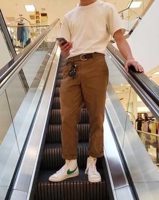 Brown Canvas Belt Outfits For Men: If you're a fan of stay-in clothes which are stylish enough to wear out, pair a white crew-neck t-shirt with a brown canvas belt. You can go down a more classic route with shoes by wearing a pair of white and green canvas high top sneakers.