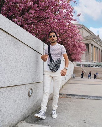 Black Canvas Fanny Pack Outfits For Men: If you're on a mission for a modern casual yet dapper look, team a white print crew-neck t-shirt with a black canvas fanny pack. Add grey print canvas high top sneakers to the equation for a dash of polish.
