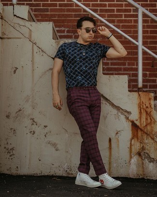 White Print Canvas High Top Sneakers Outfits For Men: Pair a navy print crew-neck t-shirt with burgundy plaid chinos for a modern twist on off-duty combinations. When it comes to shoes, this look is complemented nicely with white print canvas high top sneakers.