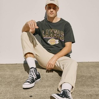 Olive Print Crew-neck T-shirt Outfits For Men: Go for a simple yet cool and casual choice by opting for an olive print crew-neck t-shirt and beige chinos. Rounding off with black and white canvas high top sneakers is a guaranteed way to add a more laid-back spin to this outfit.