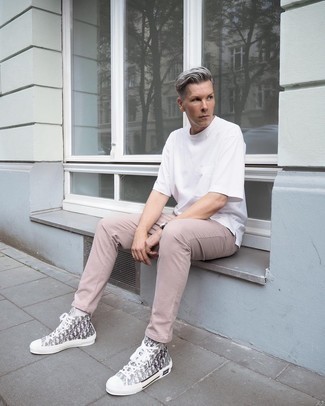 Charcoal High Top Sneakers Outfits For Men: A white crew-neck t-shirt and khaki chinos are a great ensemble to take you throughout the day and into the night. Throw a pair of charcoal high top sneakers in the mix to make the look more functional.