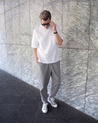 Grey Print Canvas High Top Sneakers Outfits For Men: For an on-trend outfit without the need to sacrifice on comfort, we like this combination of a white crew-neck t-shirt and grey chinos. Finishing off with grey print canvas high top sneakers is a surefire way to inject a sense of stylish nonchalance into this getup.