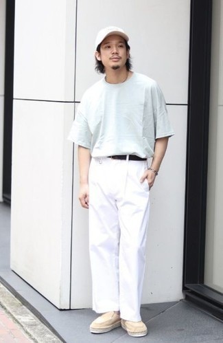 Light Blue Crew-neck T-shirt Outfits For Men: This combination of a light blue crew-neck t-shirt and white chinos epitomizes laid-back cool and relaxed menswear style. Beige suede loafers will give an elegant twist to this outfit.