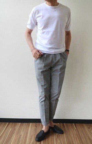Pants Hot Weather Outfits For Men After 50: A white crew-neck t-shirt looks so cool when teamed with pants. Finishing with black leather loafers is an effortless way to bring a little classiness to your getup. In this, any 50-year-old guy is guaranteed to put any younger dude to shame.