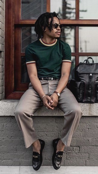 Dark Green Crew-neck T-shirt Outfits For Men: Make a dark green crew-neck t-shirt and khaki chinos your outfit choice to show you've got serious styling prowess. For a more sophisticated spin, enter a pair of black leather loafers into the equation.