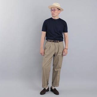 987+ Smart Casual Hot Weather Outfits For Men: Who said you can't make a fashion statement with an off-duty outfit? You can do that efforlessly in a navy crew-neck t-shirt and khaki chinos. Complement your outfit with a pair of dark brown suede loafers to take things up a notch.