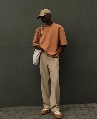 Men's Orange Crew-neck T-shirt, Khaki Chinos, White Canvas Low Top Sneakers, White Canvas Tote Bag