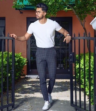 Grey Check Chinos Outfits: A white crew-neck t-shirt and grey check chinos teamed together are a good match. White leather low top sneakers are a good idea to complement this look.